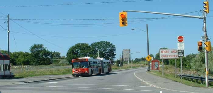 OC Transpo New Flyer D60LF articulated bus on the busway